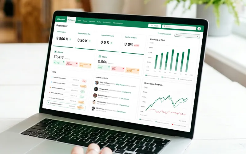 Lendora lending dashboard on a laptop in an office